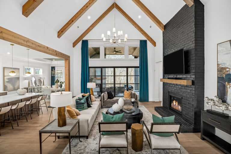Sloped Ceiling Beams with Matching Mantel & Casings